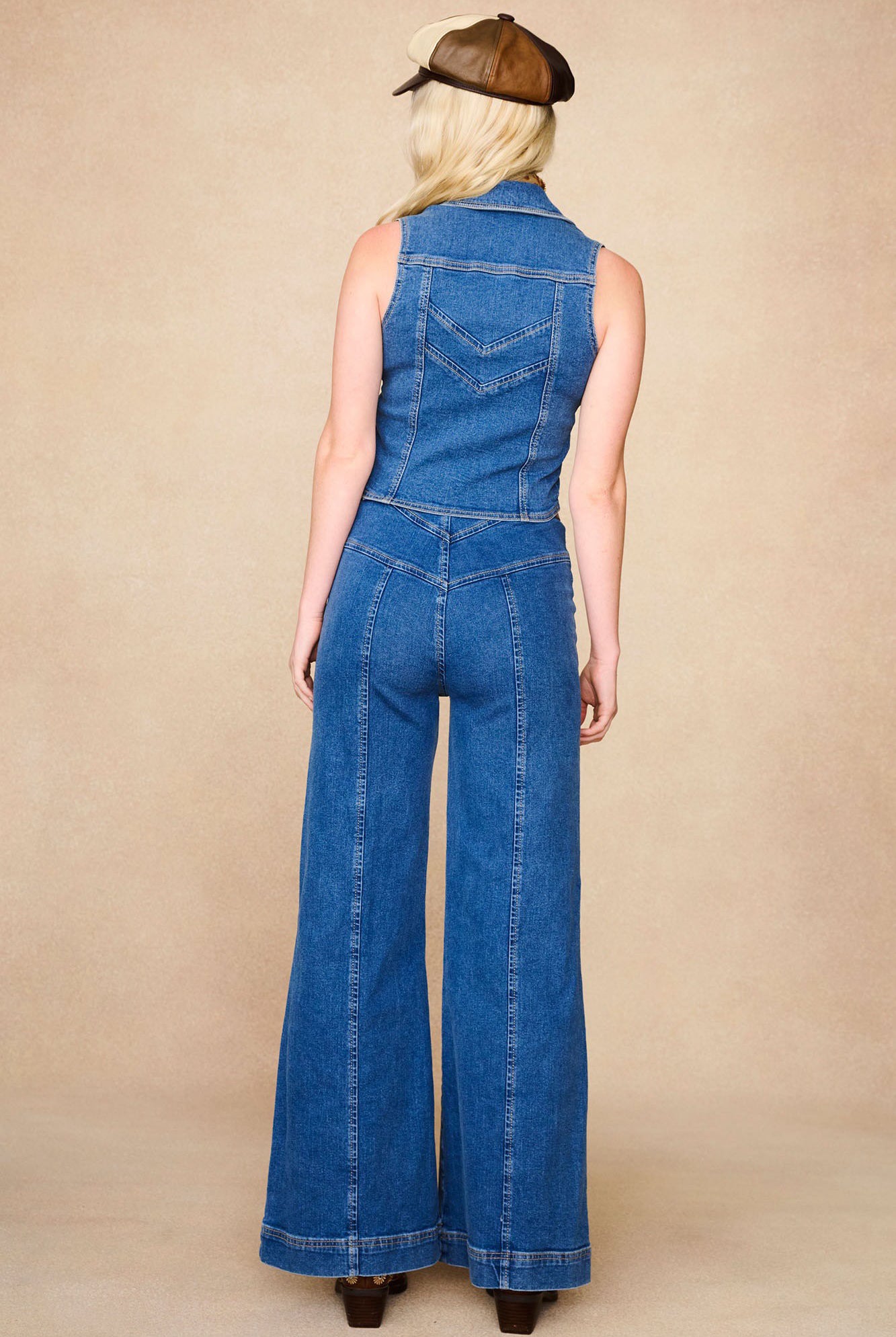 Back view of The Hippie Shake's chevron flared jeans showing V-shaped yoke and central seam panel detailing.