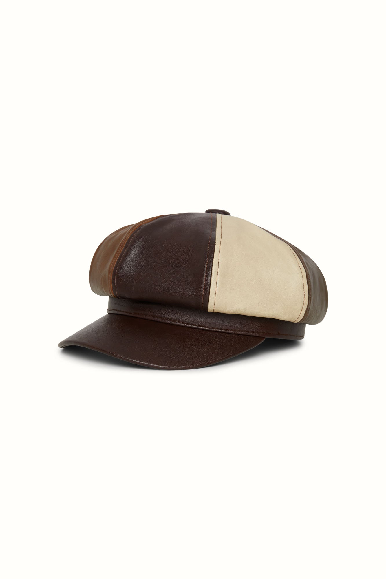 Studio shot of The Hippie Shake’s brown panelled baker hat with contrasting tan and cream leather sections.