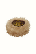 Flat lay of The Hippie Shake's brown faux fur hat showing shaggy texture and golden floral embroidery on the top panel.
