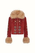 Flat lay of The Hippie Shake's red embroidered penny lane coat