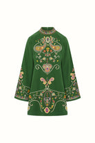 Flat lay of The Hippie Shake's green embroidered mini dress with colourful paisley and floral embroidery on a structured silhouette.