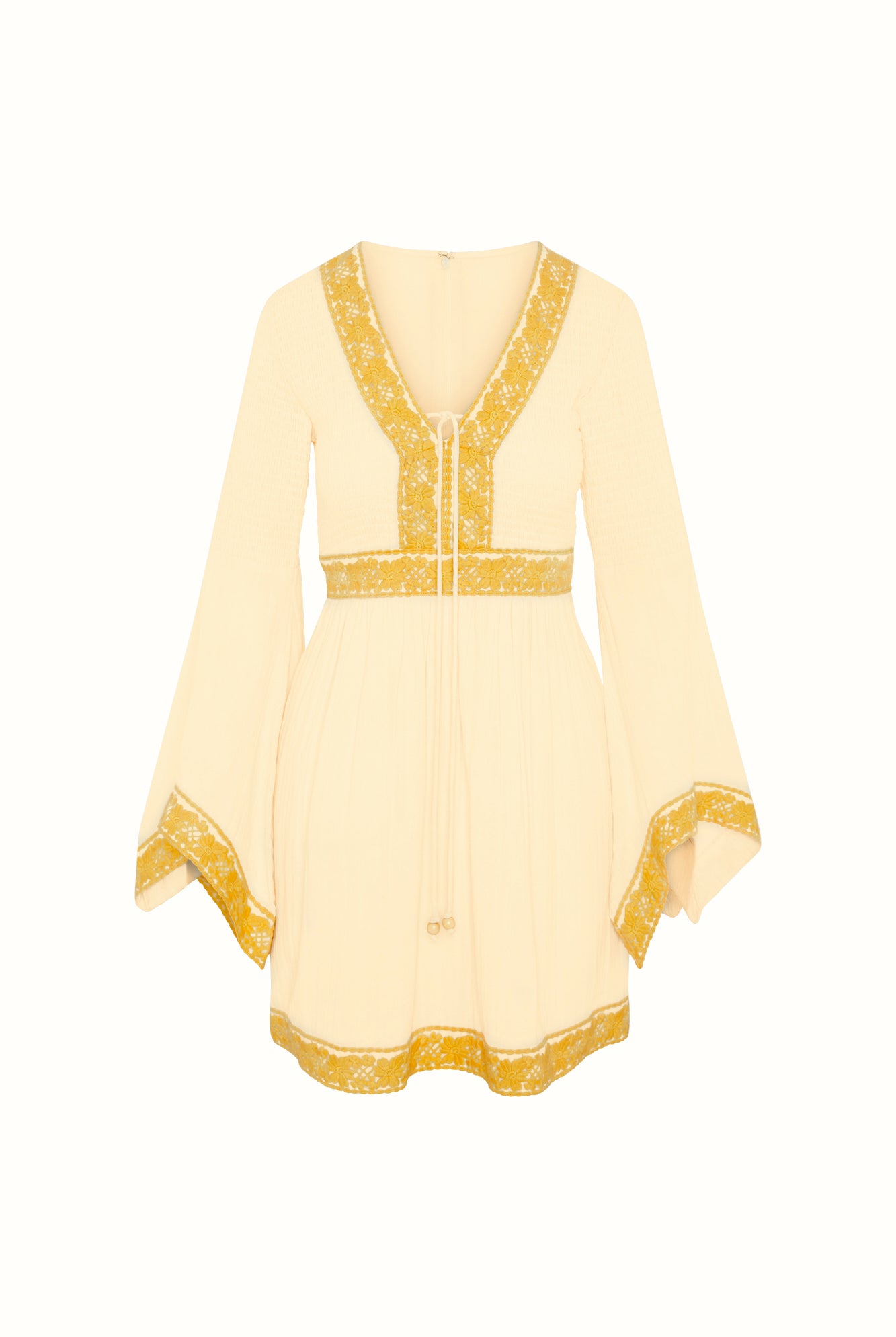 Flat lay of The Hippie Shake's cream lace trim mini dress featuring yellow floral trims and bell sleeves.