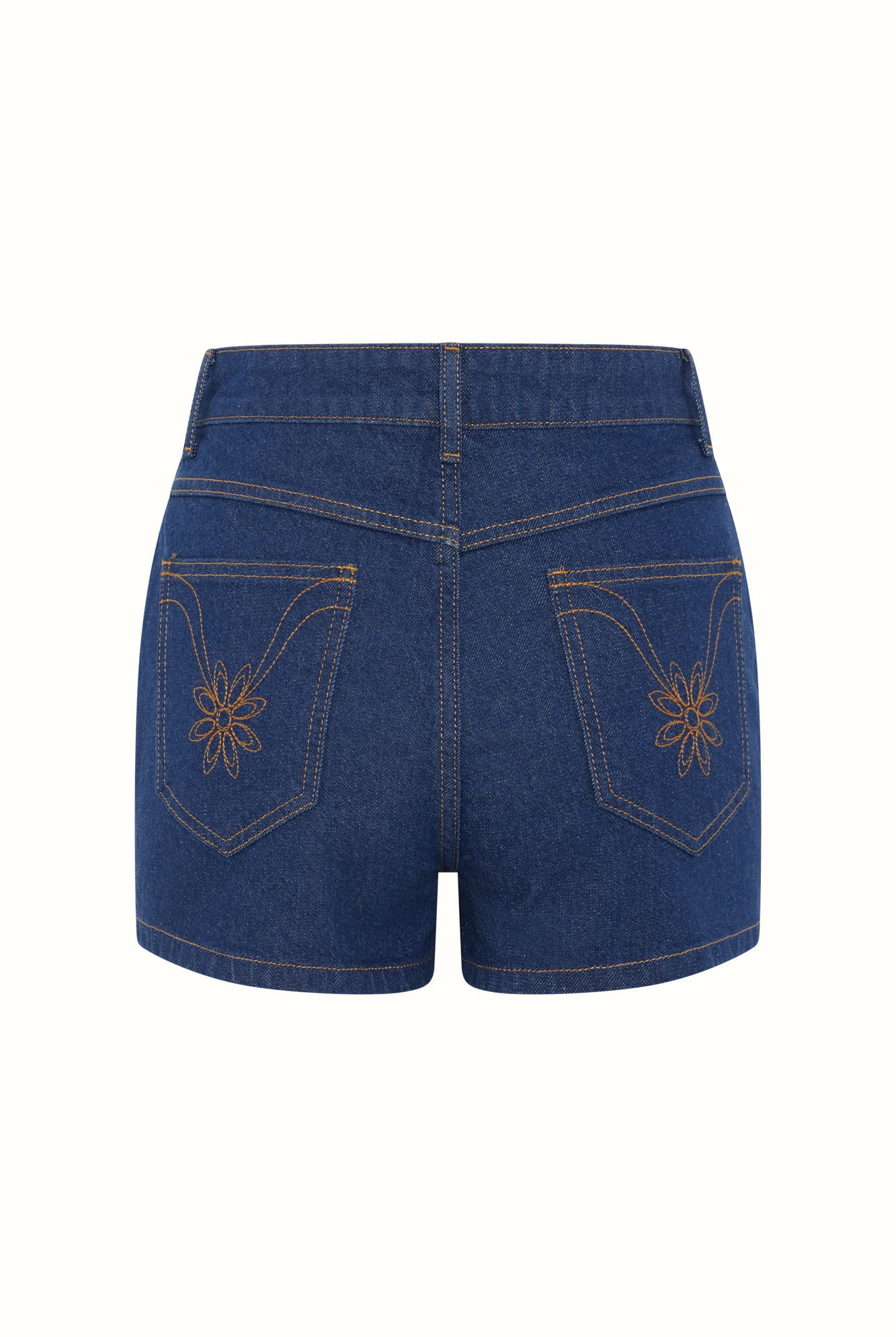 Flat lay of The Hippie Shake's women's high waisted denim shorts showing floral back pocket embroidery.