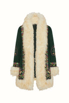 Flat lay of The Hippie Shake's green embroidered Penny Lane coat showing full embroidery and fluffy shearling trim.
