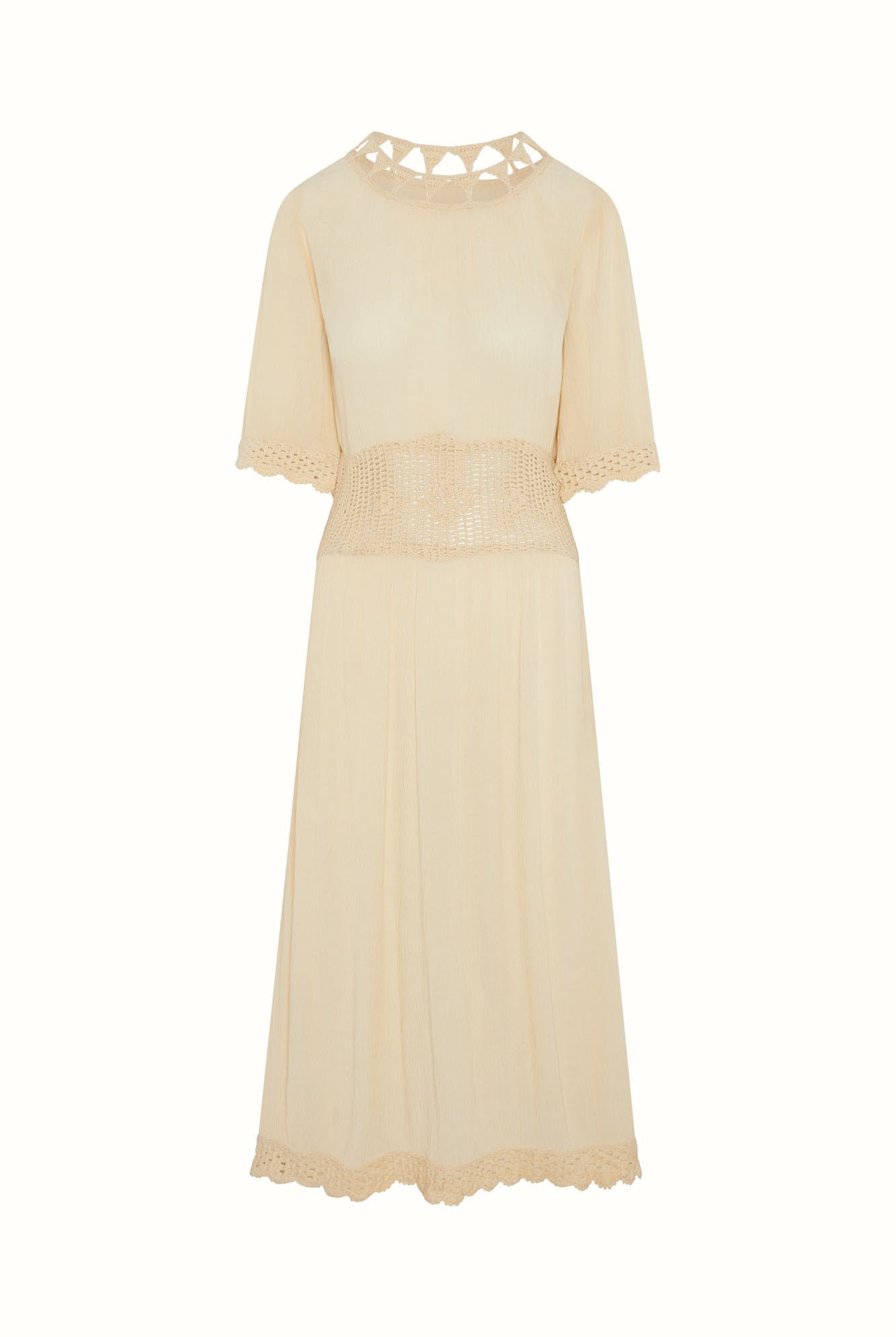 Flat lay of The Hippie Shake's cream crochet midi dress showing textured panel and shape