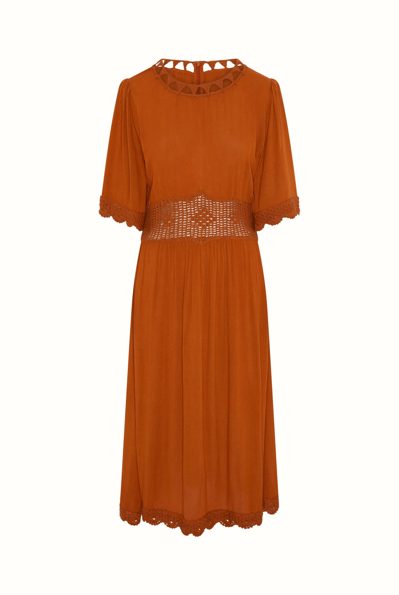Flat lay of The Hippie Shake's orange crochet midi dress with lace trim and sheer waistband panel.