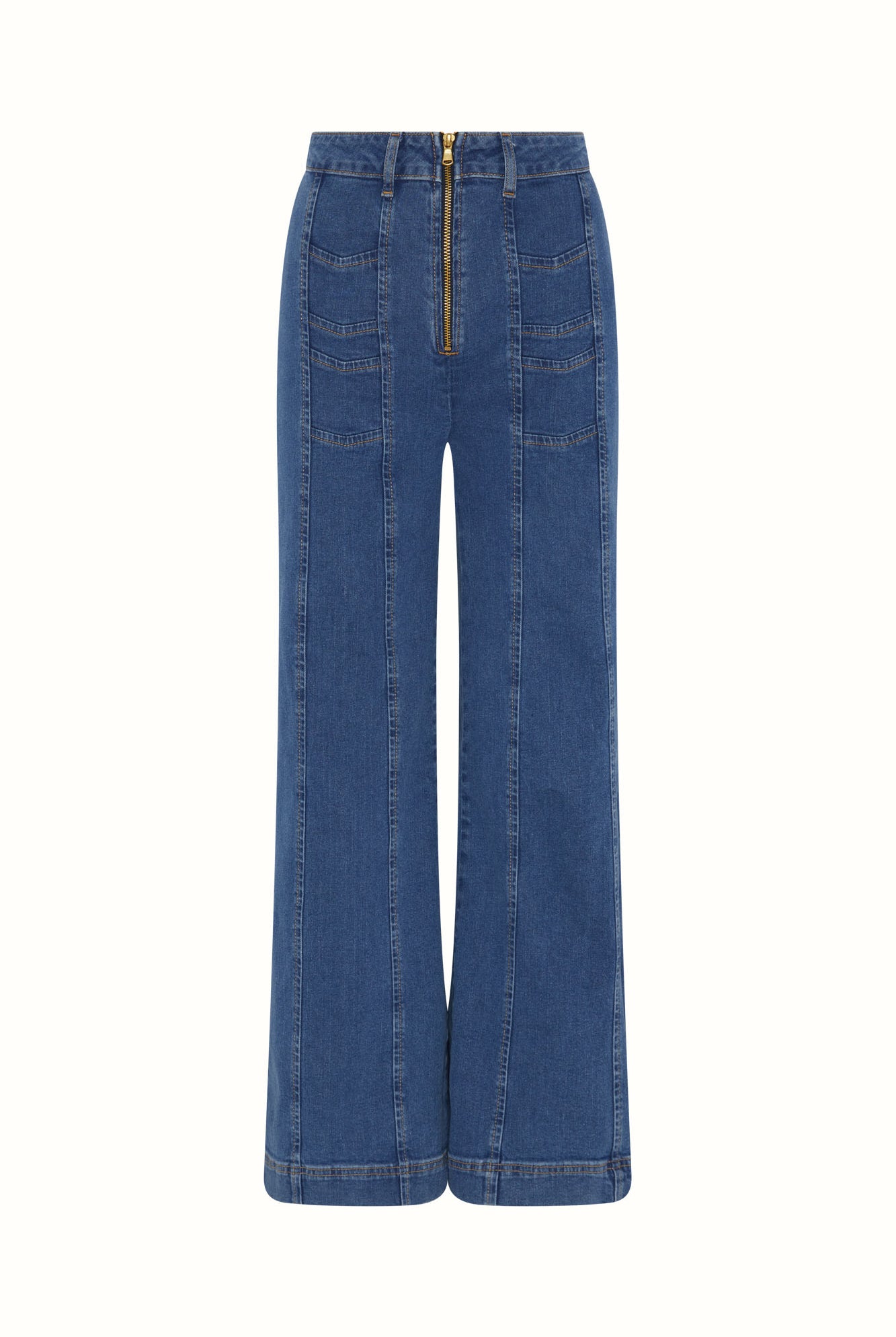 Flat lay of The Hippie Shake's chevron flared jeans with front zip, seam detailing and twin chevron front pockets.