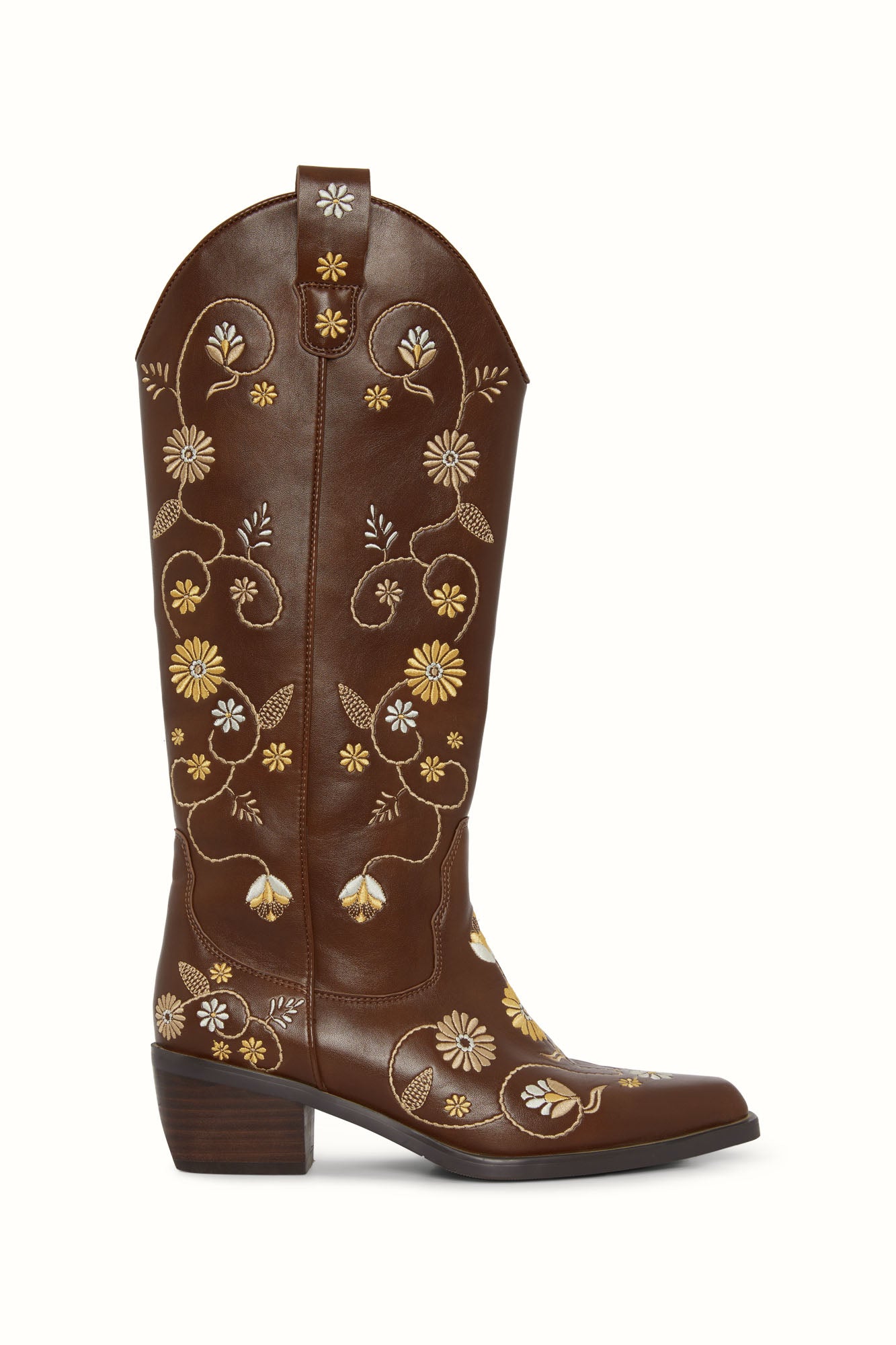 Flat lay of The Hippie Shake’s brown embroidered cowboy boot showing floral embroidery detail.