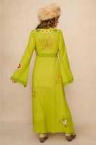 Embroidered Duster crafted from textured green cotton on a model - back view