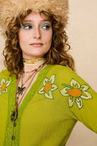 Embroidered Duster crafted from textured green cotton on a model - shoulder detail