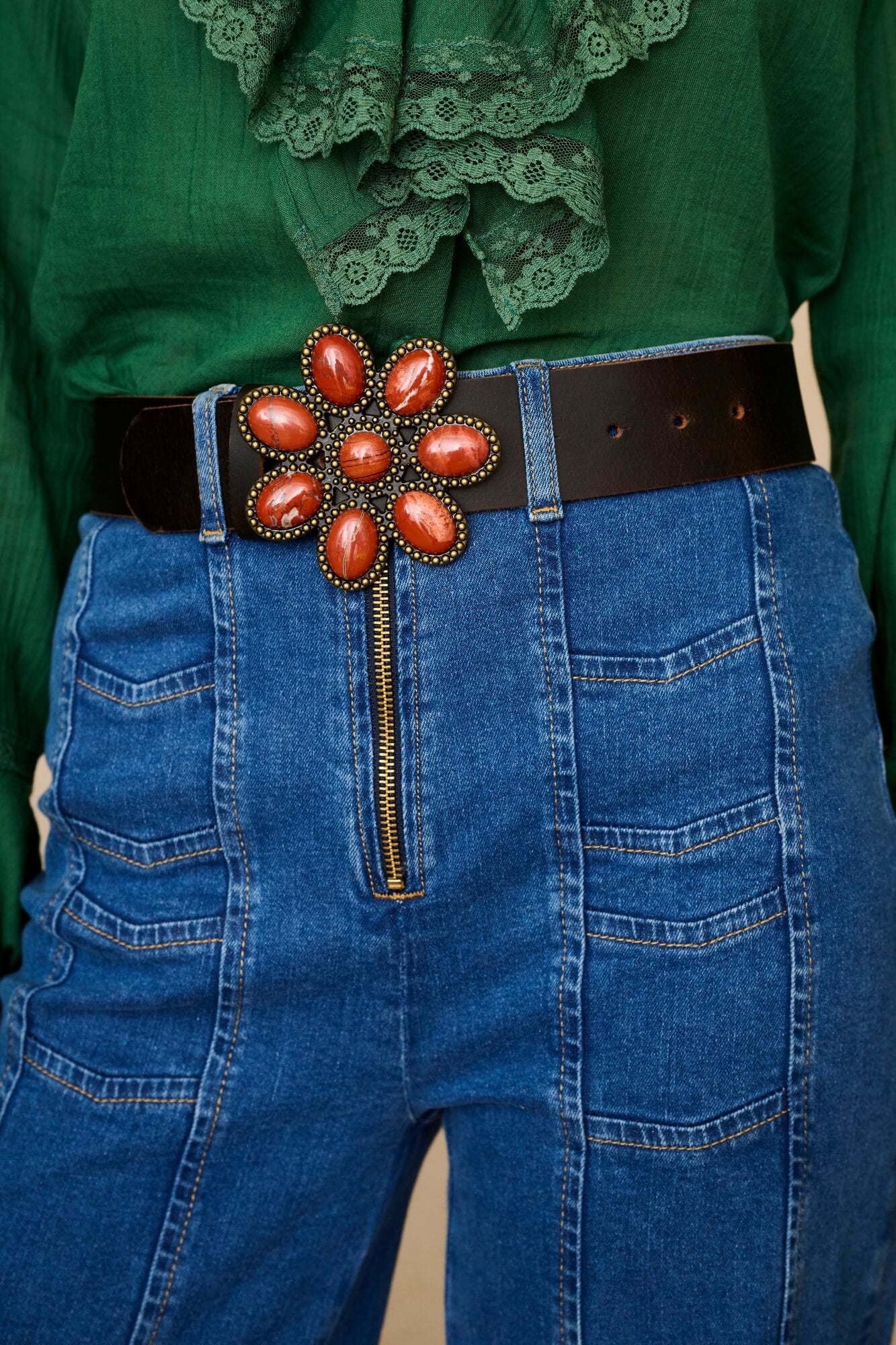 Denim Collection wear model wears 70s outfit featuring flower belt by The Hippie Shake - close up