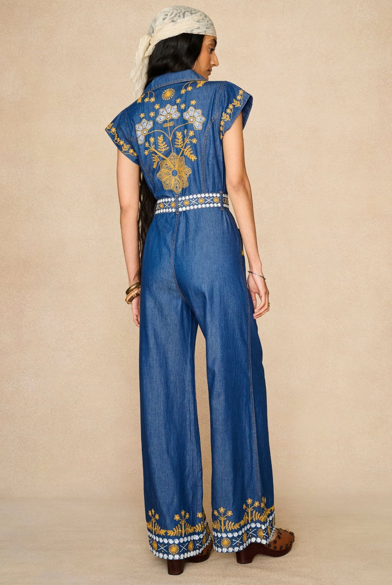 Denim Collection featuring 70s embroidered jumpsuit by The Hippie Shake - back view
