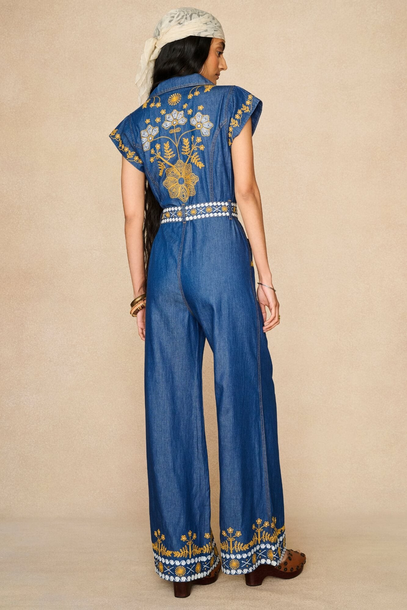 Denim Collection featuring 70s embroidered jumpsuit by The Hippie Shake - back view