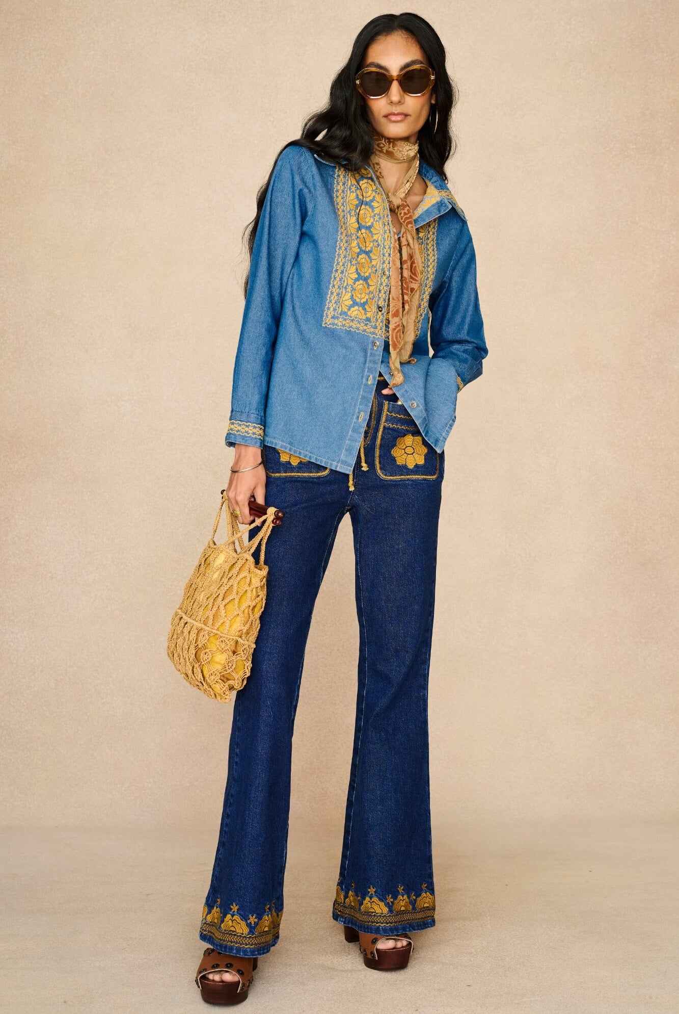 Denim Collection featuring 70s embroidered blouse by The Hippie Shake - front view