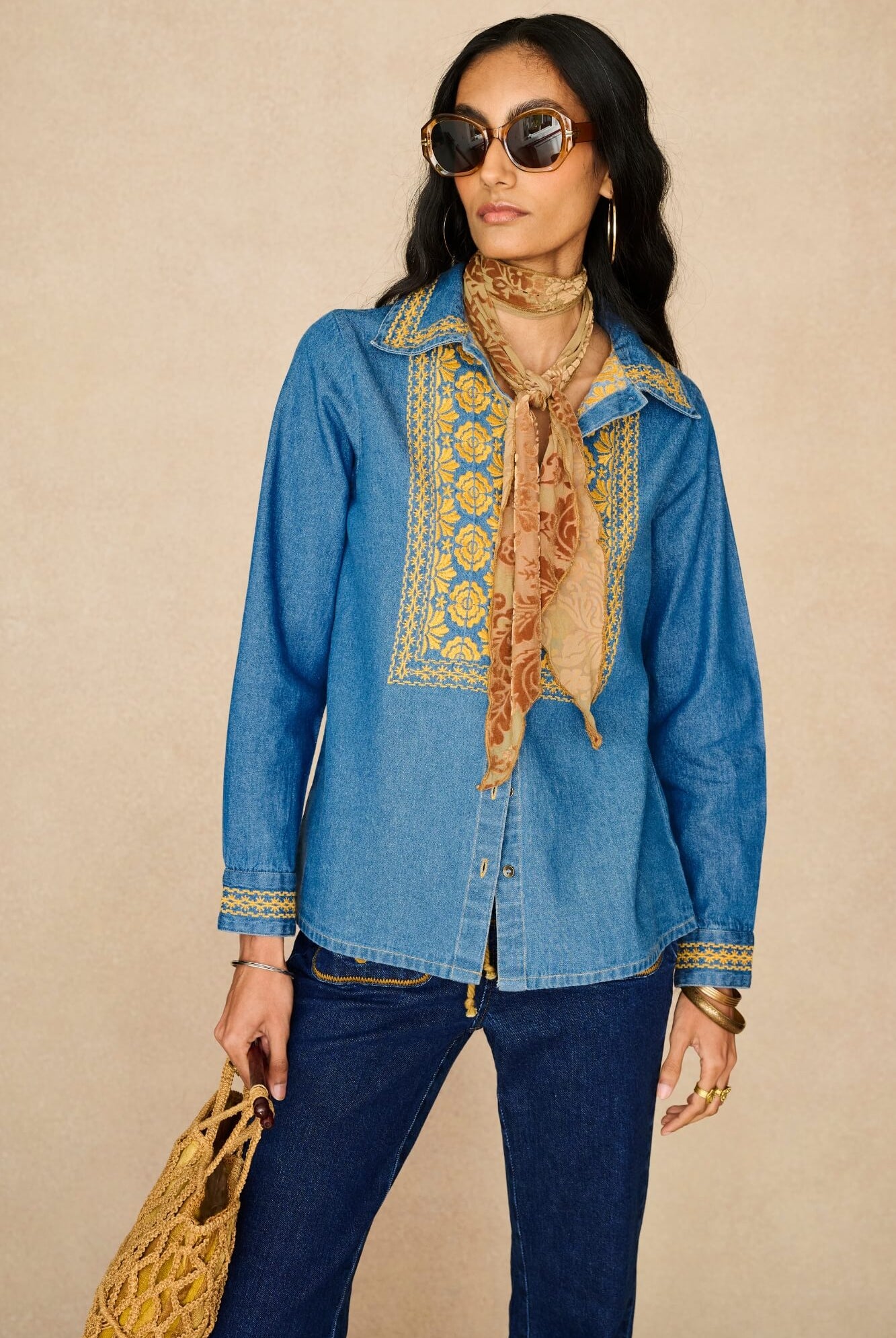 Denim Collection featuring 70s embroidered blouse by The Hippie Shake - front view