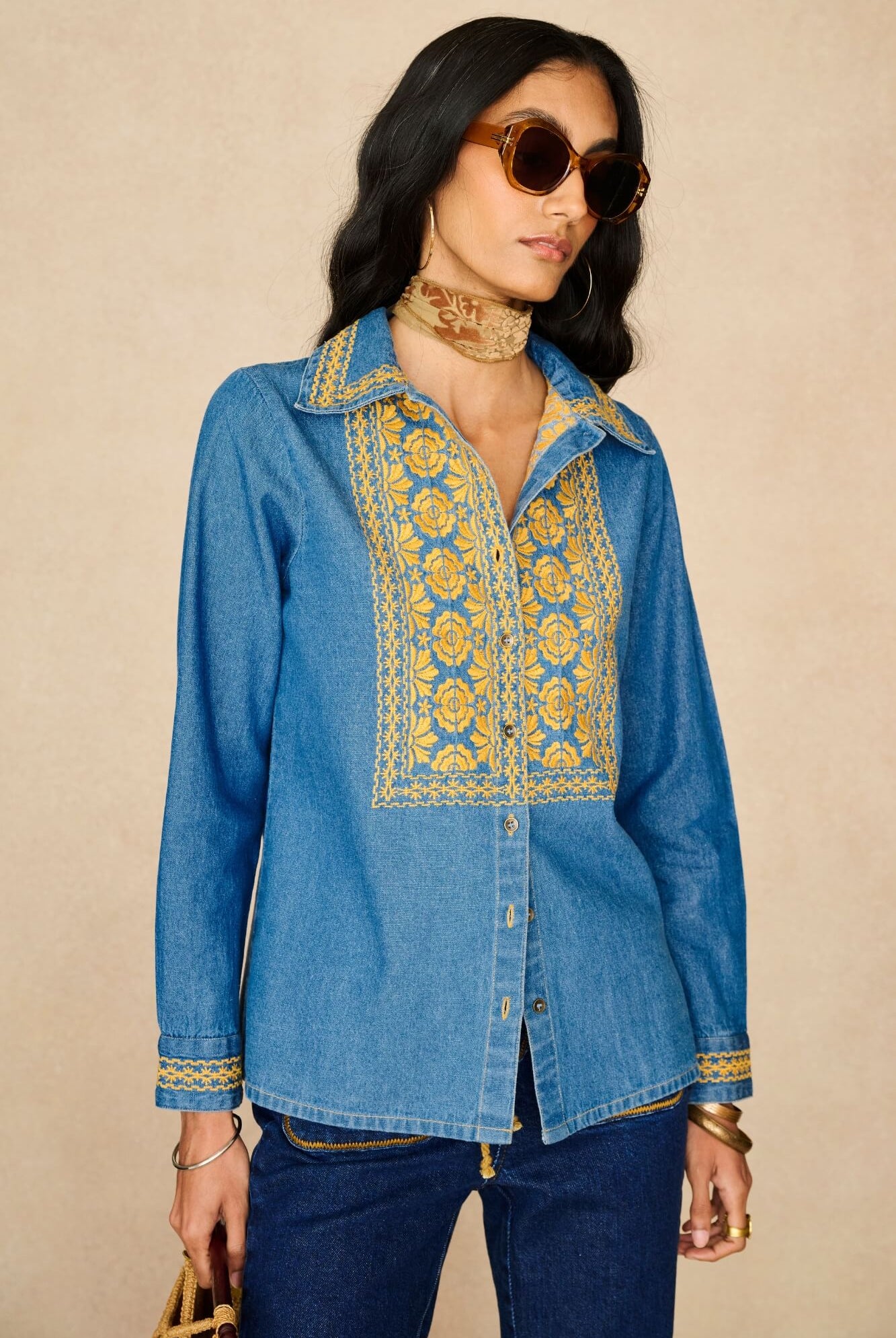 Denim Collection featuring 70s embroidered blouse by The Hippie Shake - front view