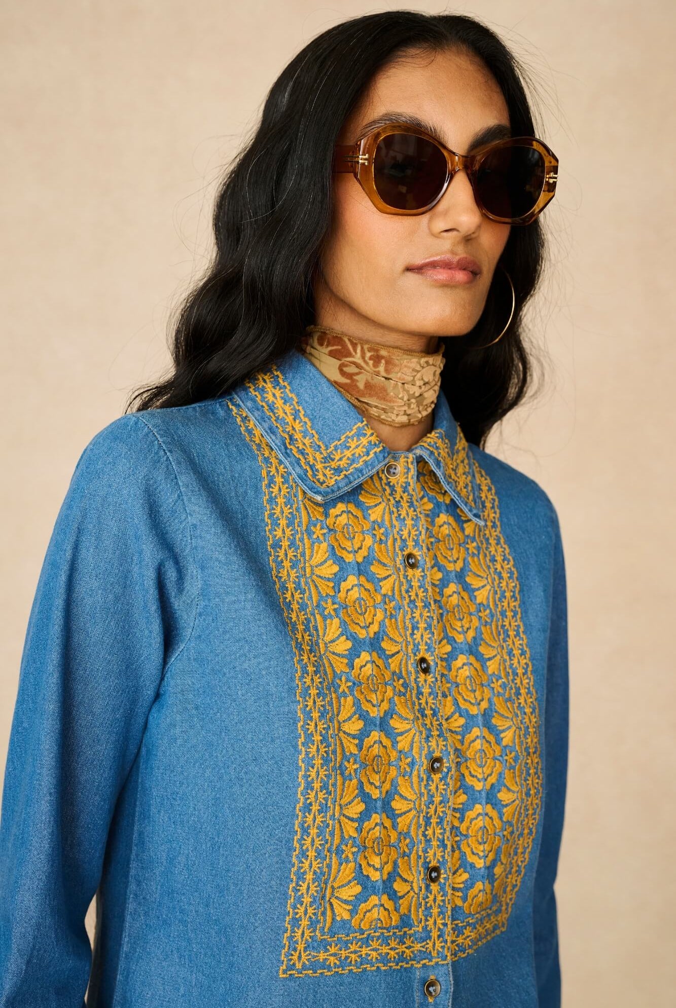 Denim Collection featuring 70s embroidered blouse by The Hippie Shake - close up