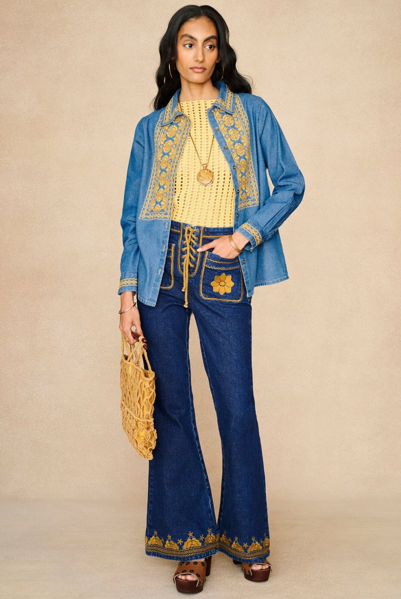Denim Collection featuring 70s embroidered blouse by The Hippie Shake - front view