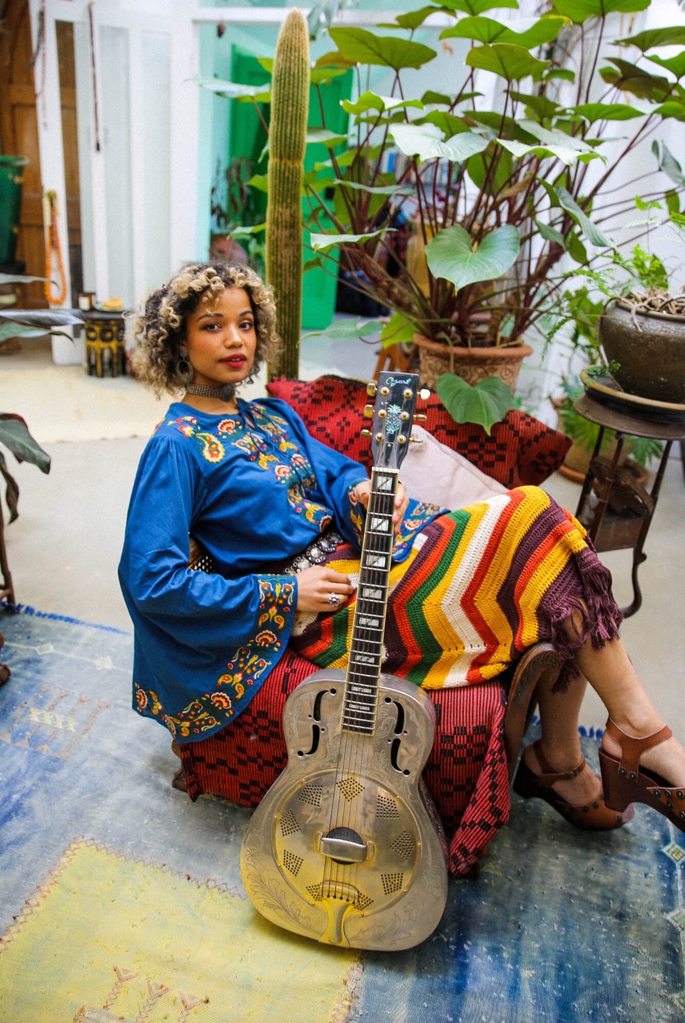 Magic Carpet Ride collection featuring 70s blue embroidered top by The Hippie Shake
