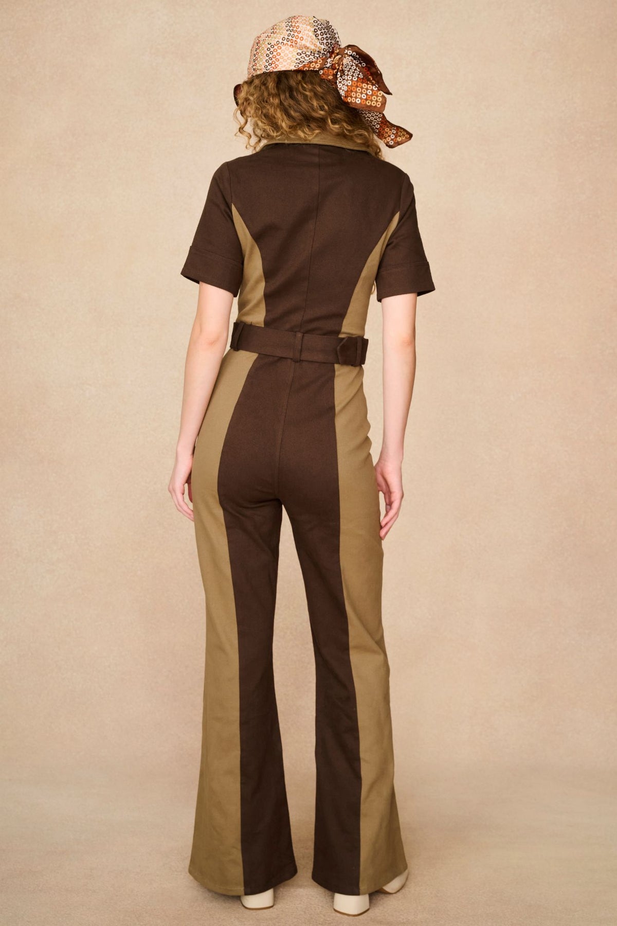 Underground Collection featuring 70s brown collared jumpsuit by The Hippie Shake