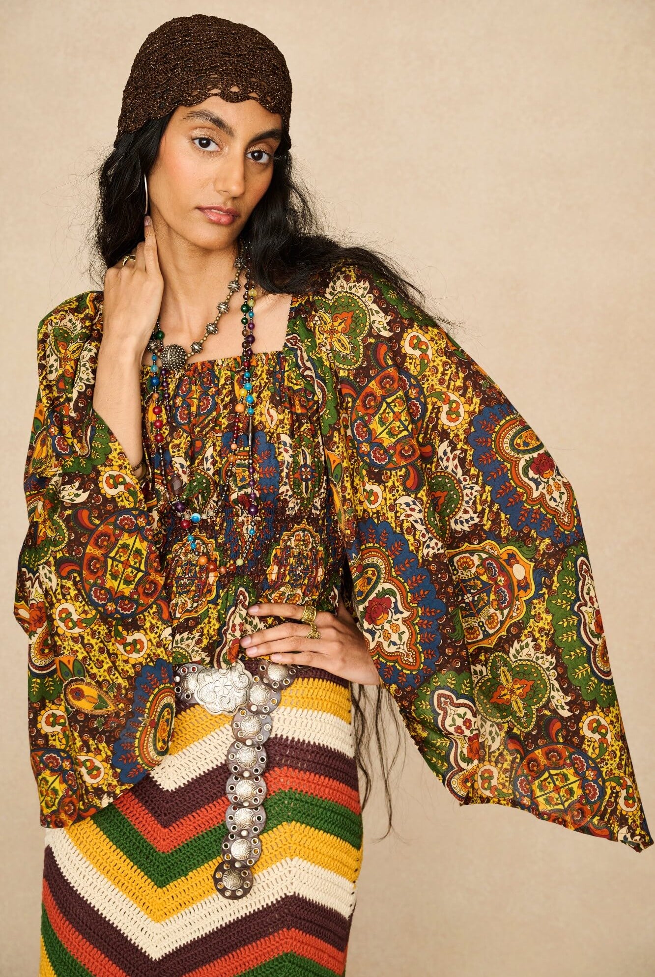 Model wearing 70s printed long sleeve top by The Hippie Shake, close up