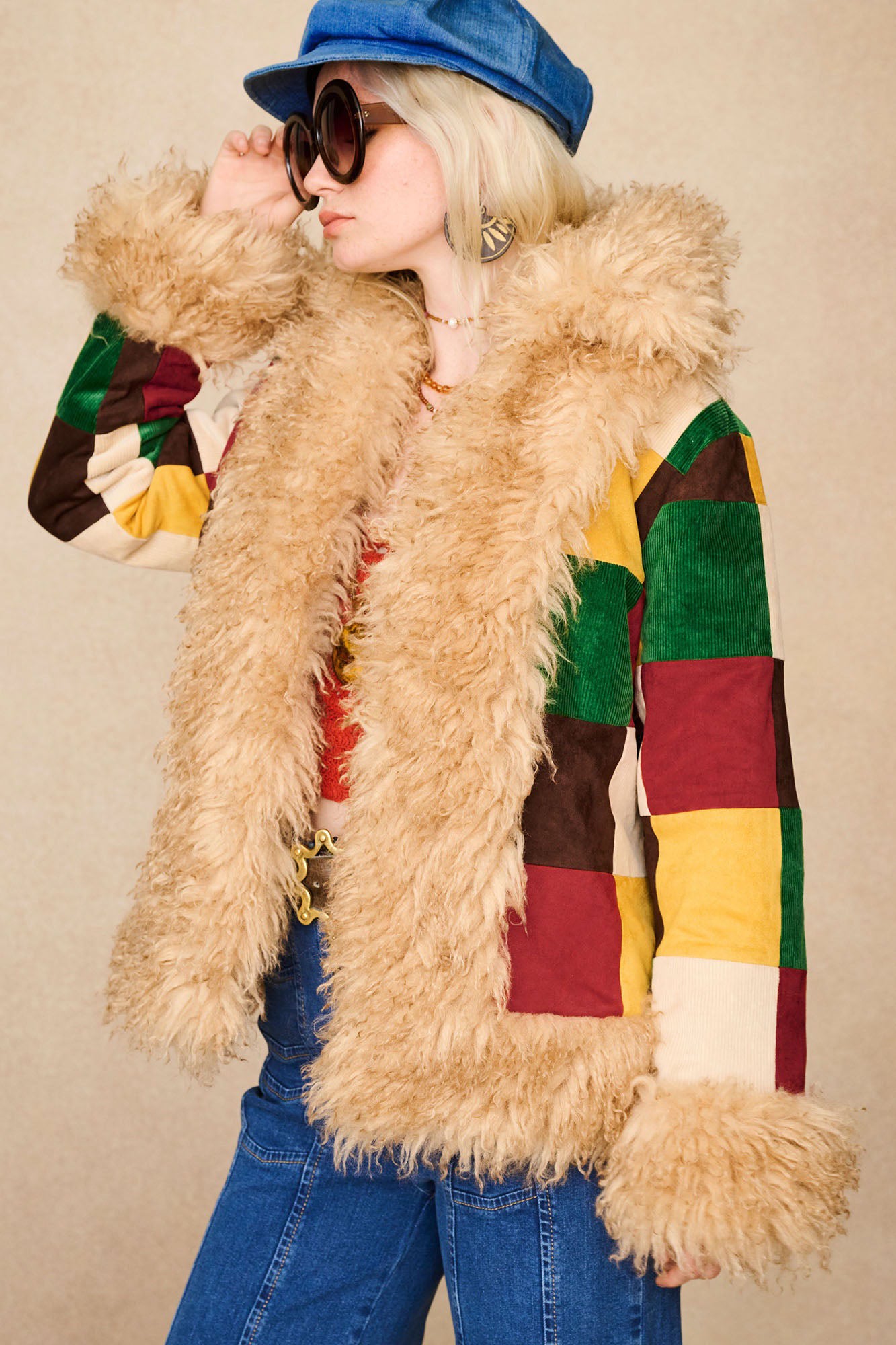 The Hippie Shake's vintage inspired patchwork Penny Lane coat with multi coloured panels and fluffy faux fur trims.