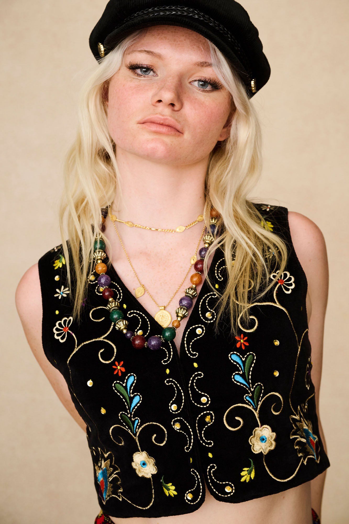 The Hippie Shake's black velvet embroidered waistcoat vest worn with our black corduroy baker hat.