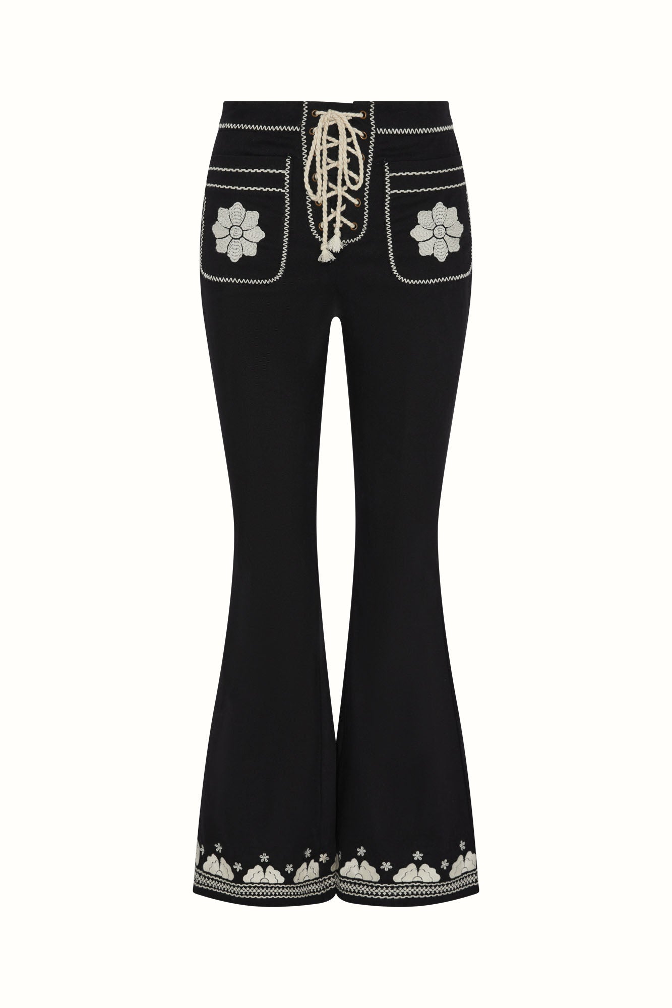 The Hippie Shake's black embroidered floral flared trousers on white background.