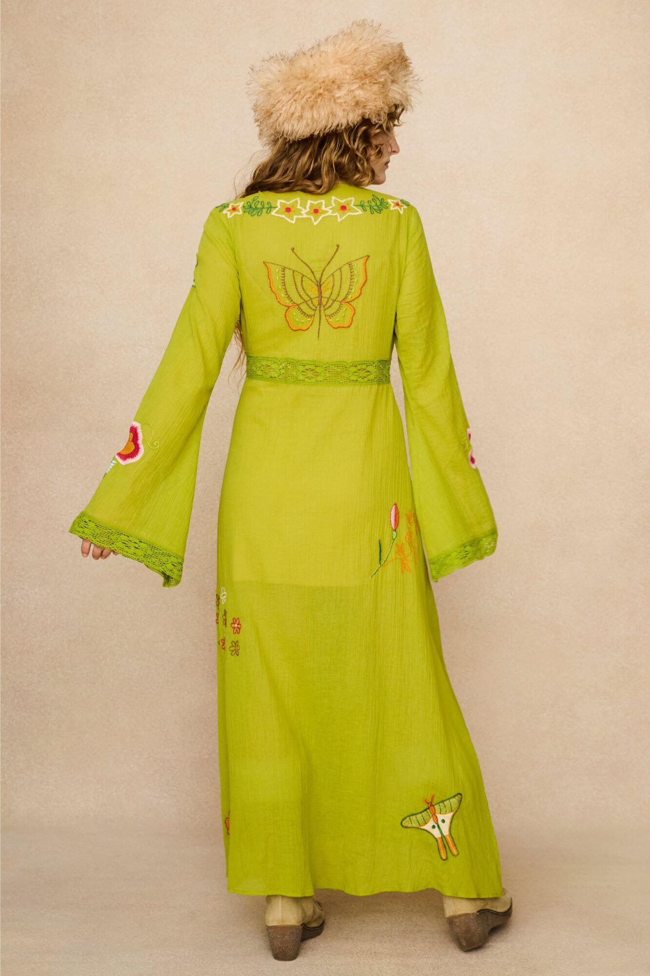 Embroidered Duster crafted from textured green cotton on a model - back view
