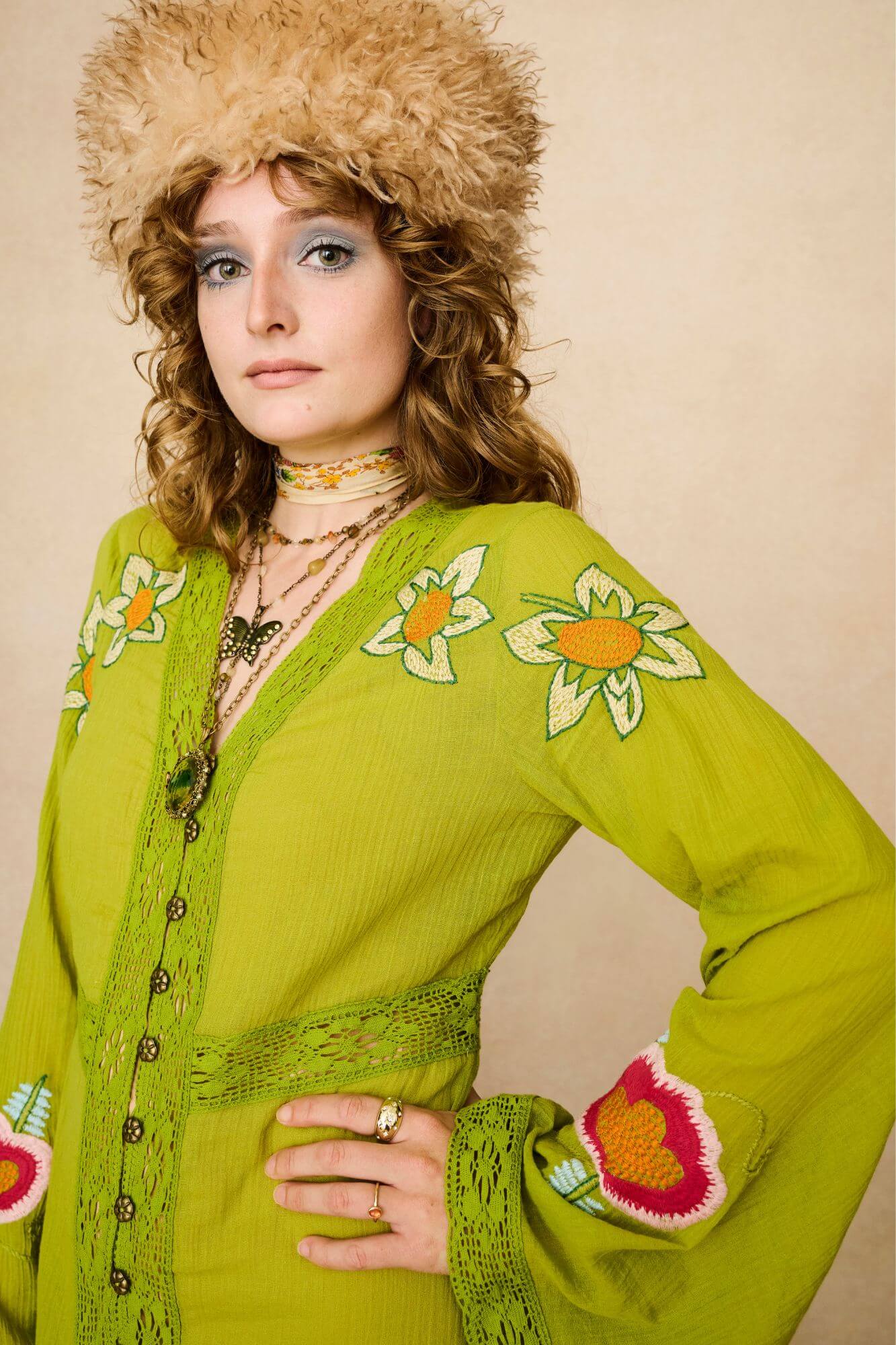 Embroidered Duster crafted from textured green cotton on a model - close front view