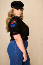 Black floral embroidered blouse in soft cotton with shirred details. A vintage-inspired Penny Lane blouse by The Hippie Shake - side view