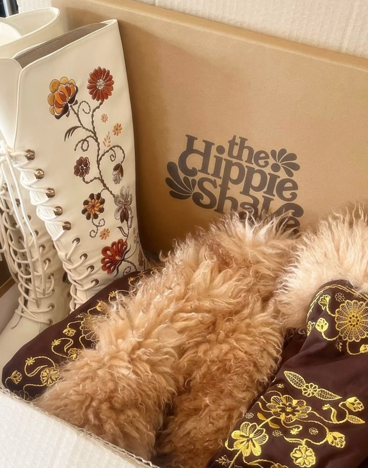 UGC unboxing of the Hippe Shake Penny Lane cream floral embroidered boots and Penny Lane coat