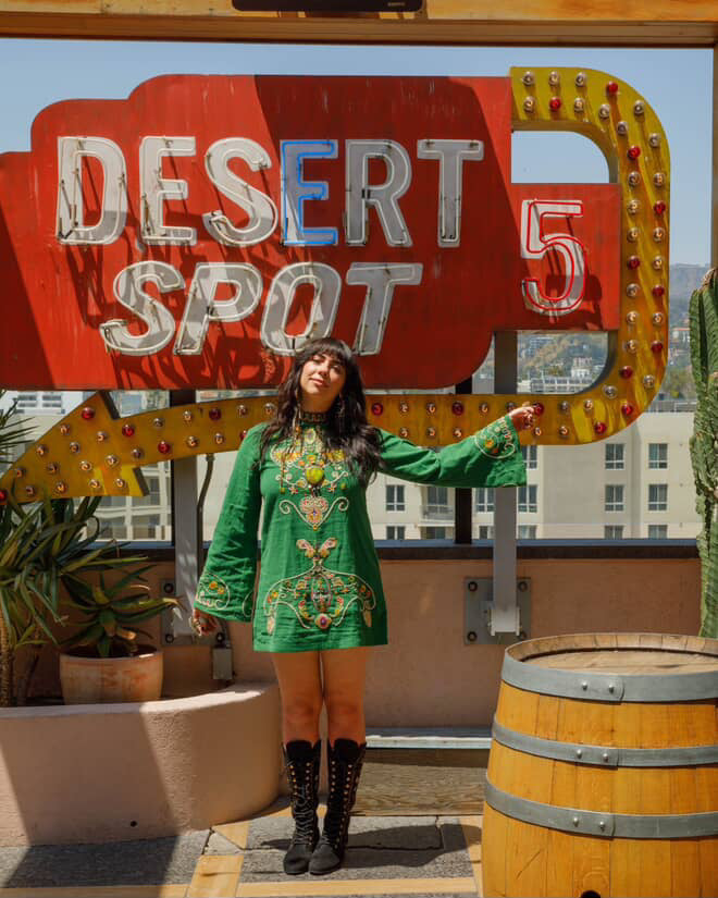 UGC of @modernmythjewelry wearing The Hippie Shake's Willow Green Mini Dress