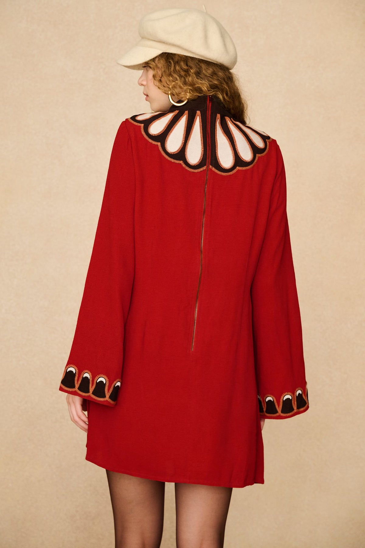 Underground Collection featuring 70s red long sleeve mini dress by The Hippie Shake - back view