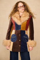 Model wearing 70s patchwork Penny Lane coat with faux fur collar by The Hippie Shake - front view