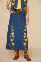Denim Collection wear model wears 70s denim skirt featuring flower belt by The Hippie Shake - front view