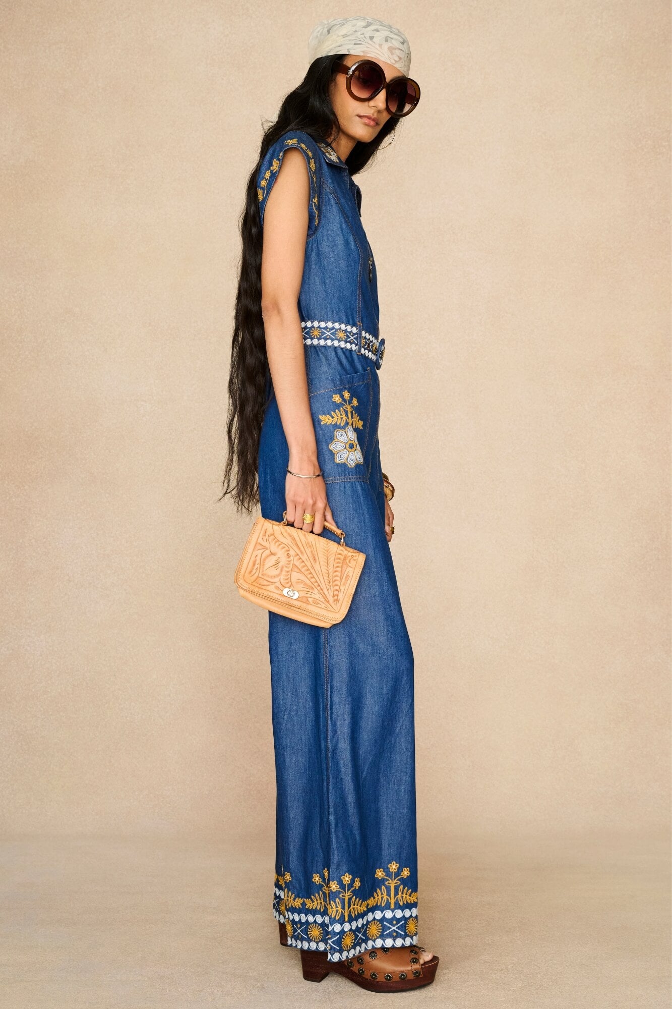 Denim Collection featuring 70s  embroidered jumpsuit by The Hippie Shake - side view