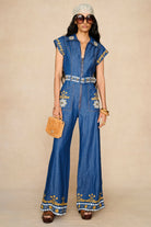 Denim Collection featuring 70s  embroidered jumpsuit by The Hippie Shake - front view