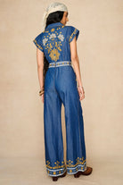 Denim Collection featuring 70s  embroidered jumpsuit by The Hippie Shake - back view