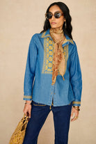 Denim Collection featuring 70s  embroidered blouse by The Hippie Shake - front view