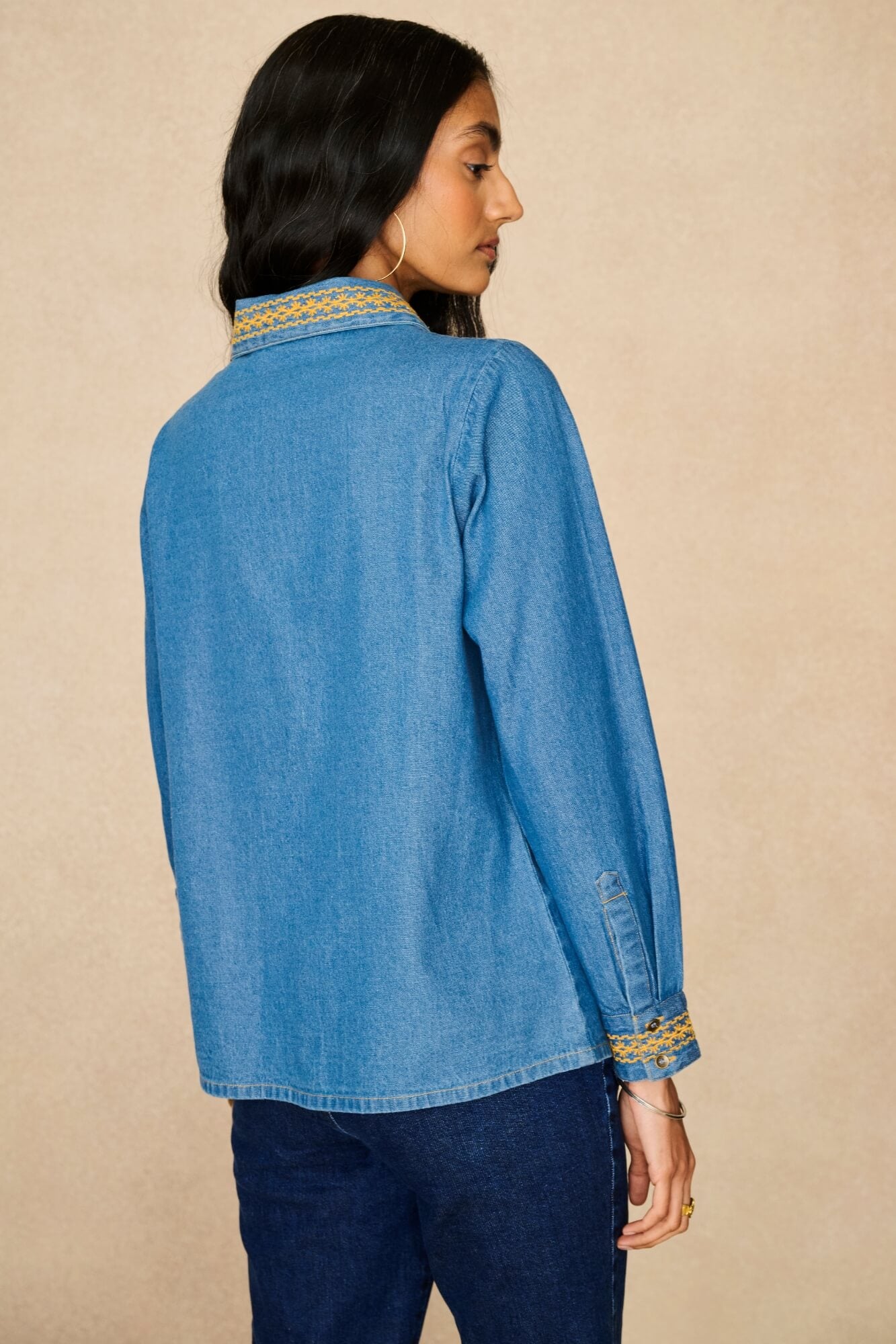 Denim Collection featuring 70s  embroidered blouse by The Hippie Shake - back view