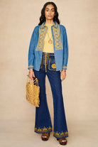 Denim Collection featuring 70s  embroidered blouse by The Hippie Shake - front view