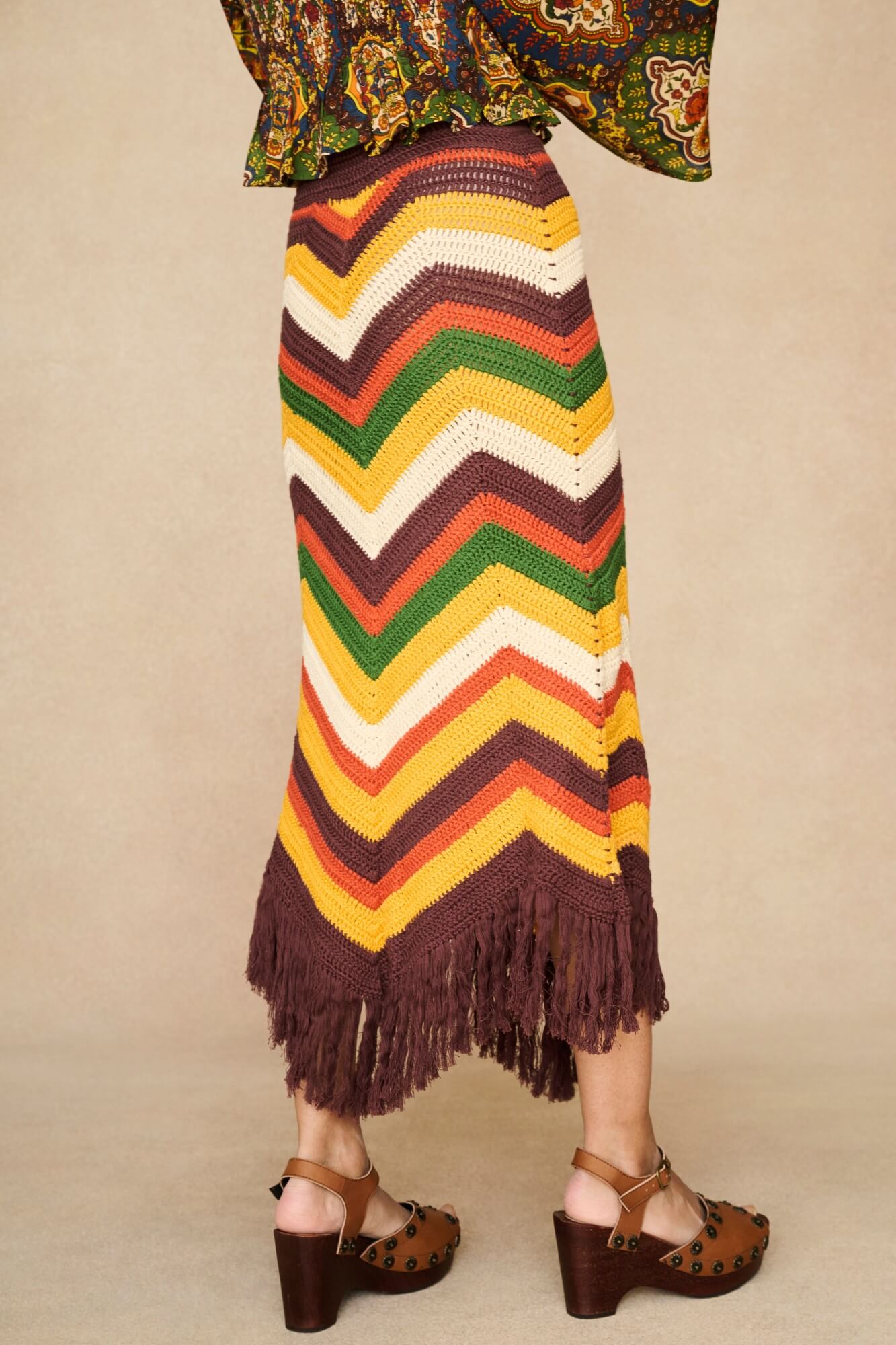 Model wearing 70s striped knitted skirt  by The Hippie Shake, side view