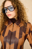 Underground Collection featuring 70s brown patterned leather jacket by The Hippie Shake - close up