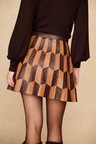 Underground Collection featuring 70s brown patterned leather skirt by The Hippie Shake