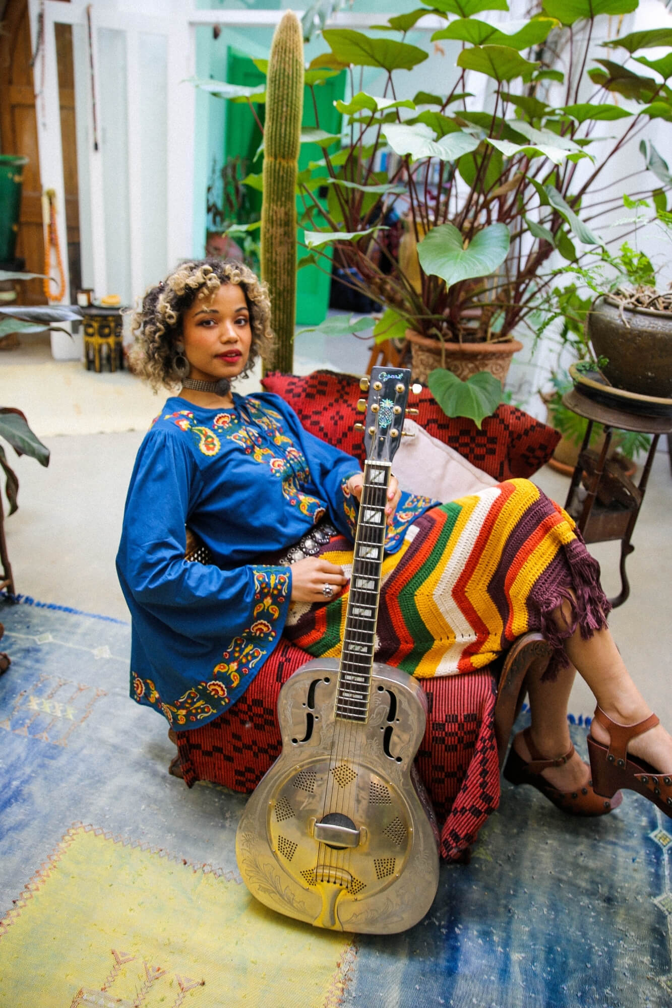 Magic Carpet Ride collection featuring 70s blue embroidered top by The Hippie Shake