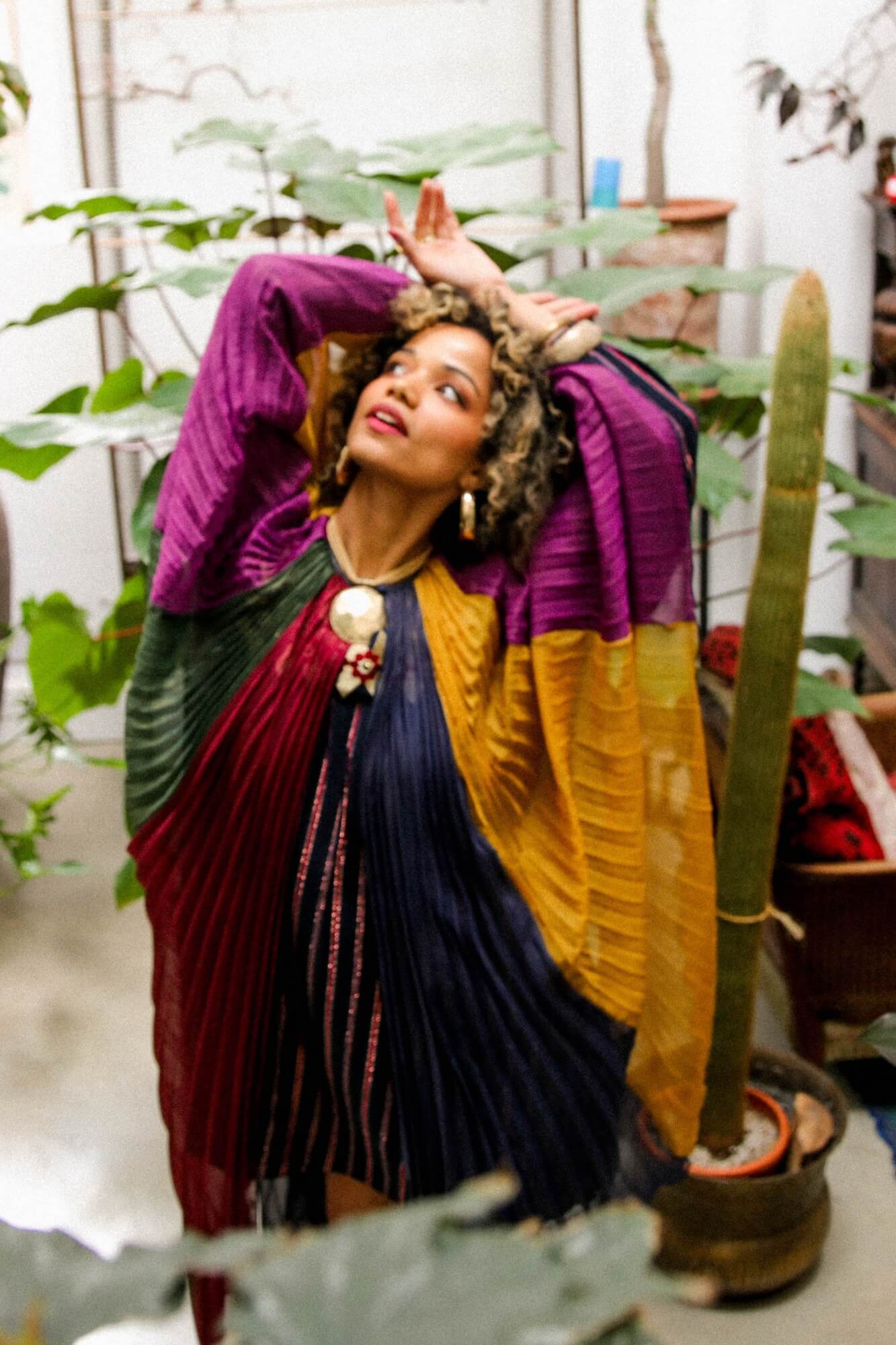 Magic Carpet Ride collection featuring 70s rainbow cape by The Hippie Shake