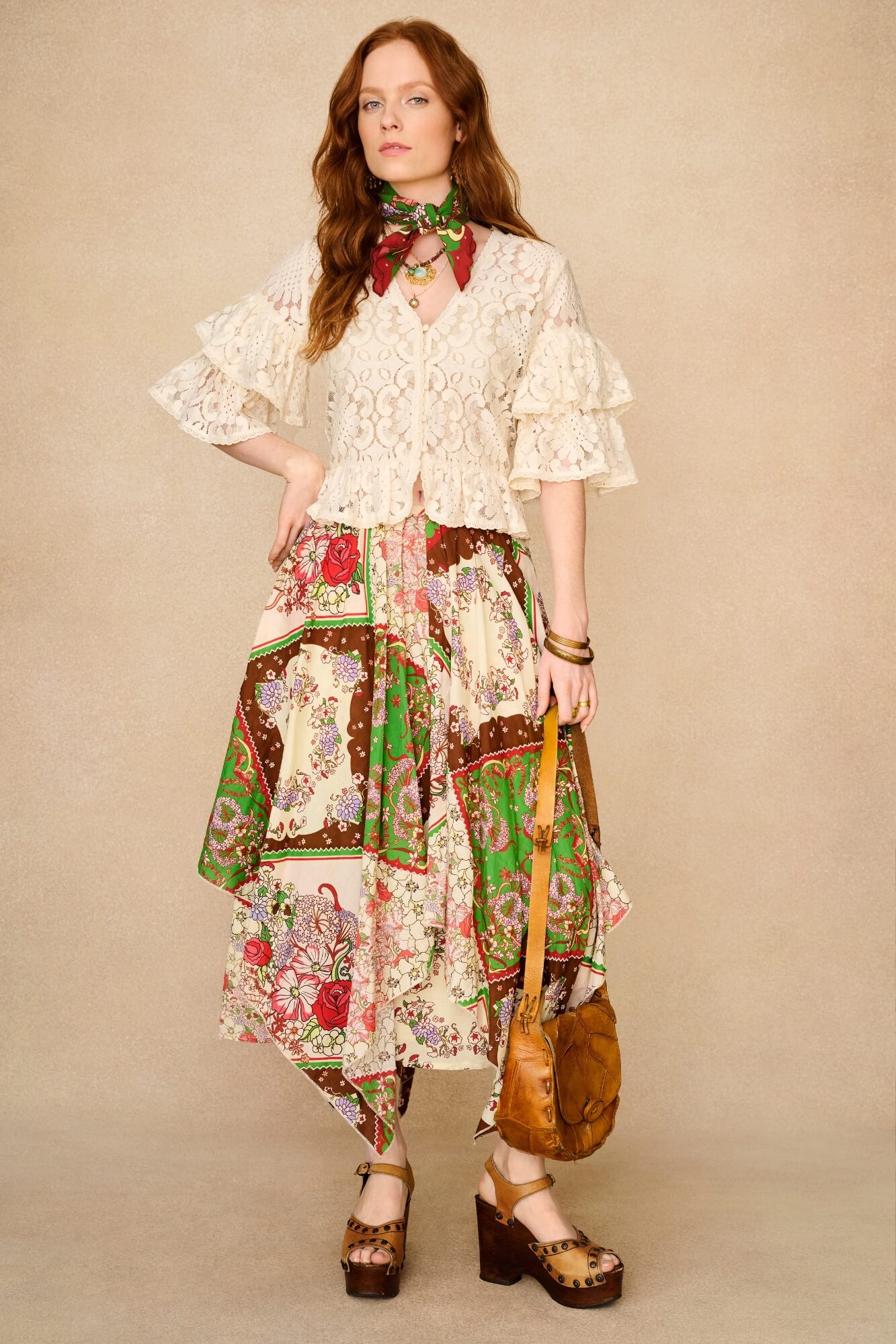 Woman wearing a floral dress with a beige background