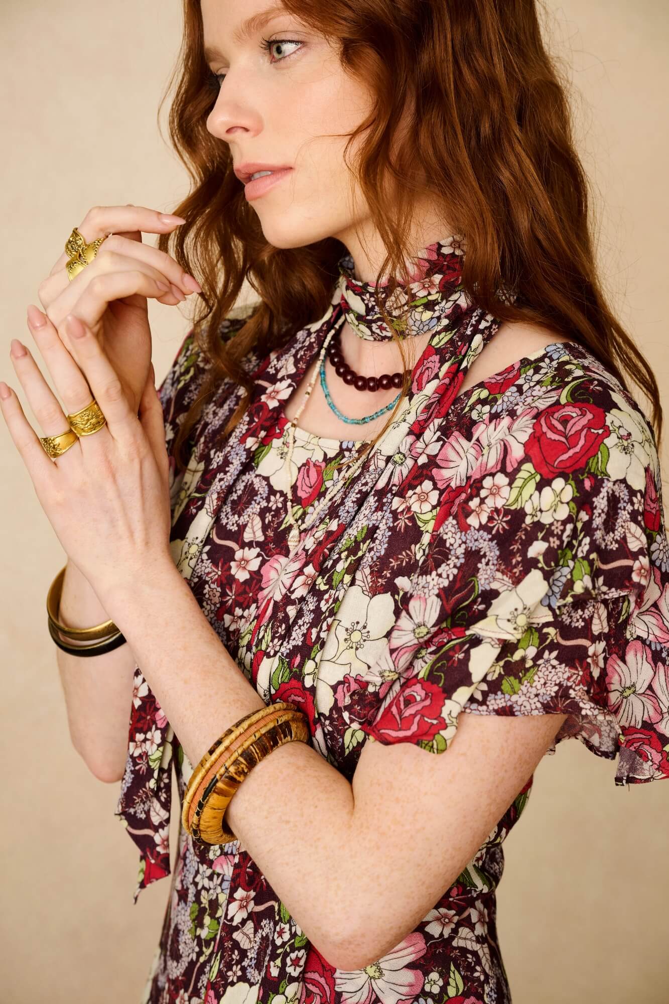woman wears 70s floral dress