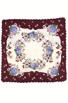 Decorative scarf with floral pattern on a white background